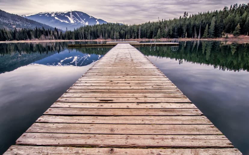 Wooden dock at a mountain lake in Whistler, BC