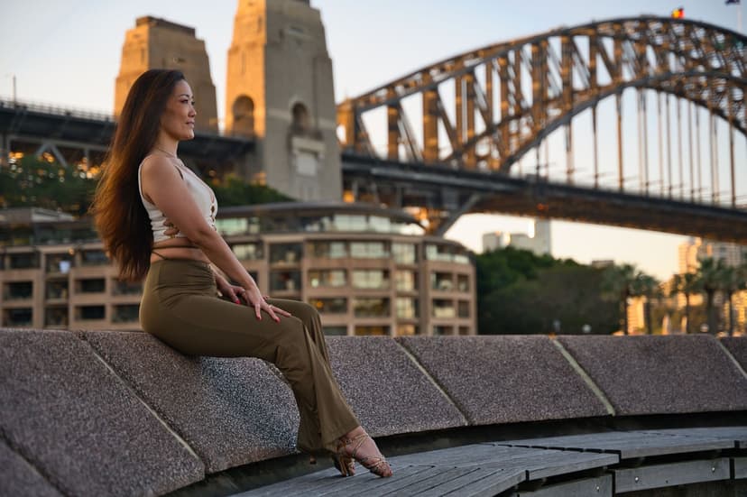 The Sydney Harbour Bridge at dusk over the water, an urban coastal lifestyle scene